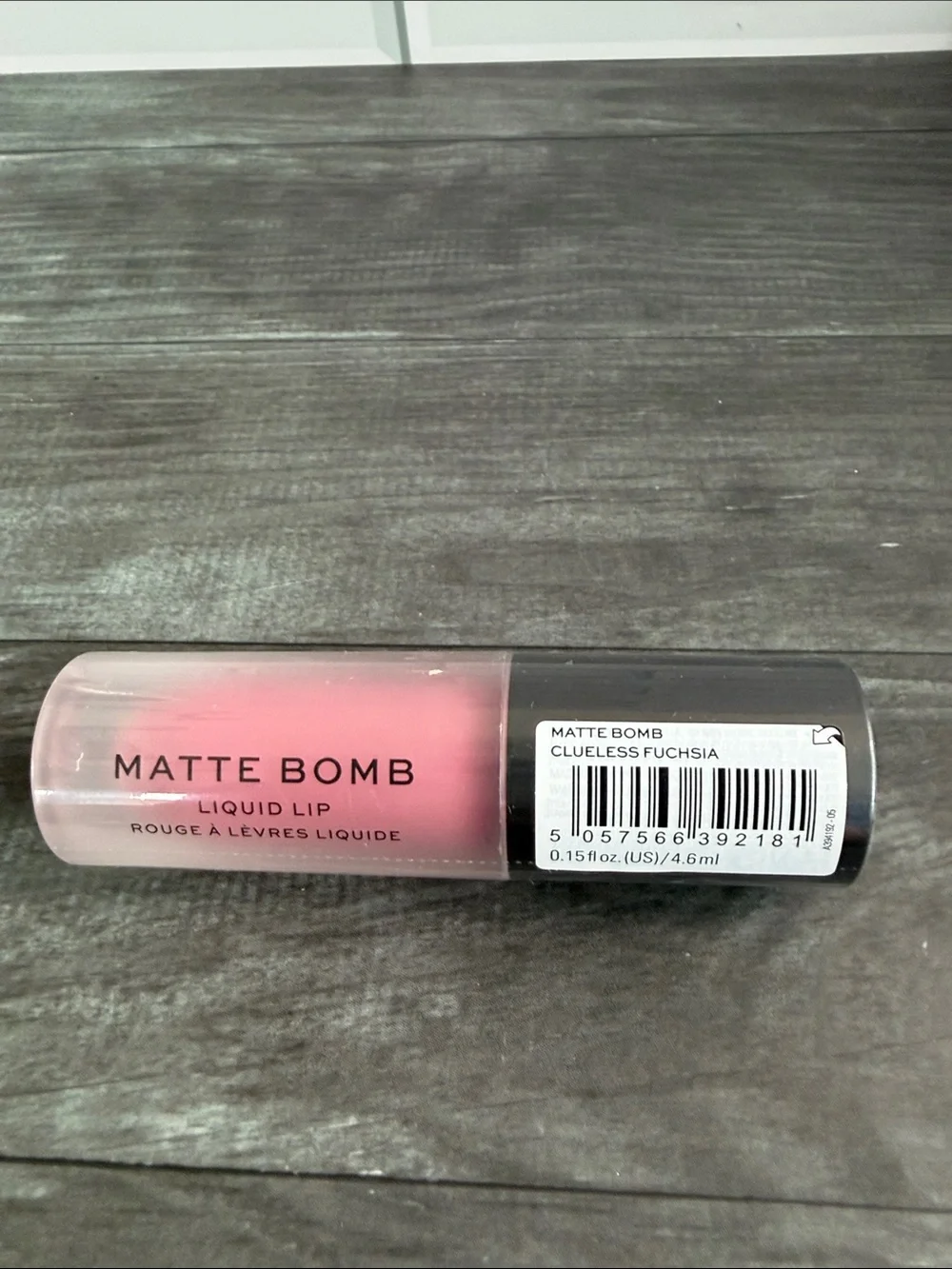Revolution Pink and Black Lipstick Bottle